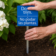 Load image into Gallery viewer, Do Not Trim Bilingual Garden Sign – Durable Acrylic Yard Marker with Stainless Steel Stakes – English &amp; Spanish Landscape Warning
