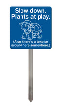 Load image into Gallery viewer, Tortoise Garden Sign – “Slow Down, Plants at Play” – Funny Acrylic Yard Sign with Stainless Steel Stake

