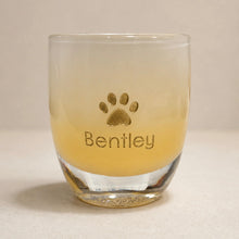 Load image into Gallery viewer, glassybaby votive with paw print and 'Bentley' engraving on a beige background
