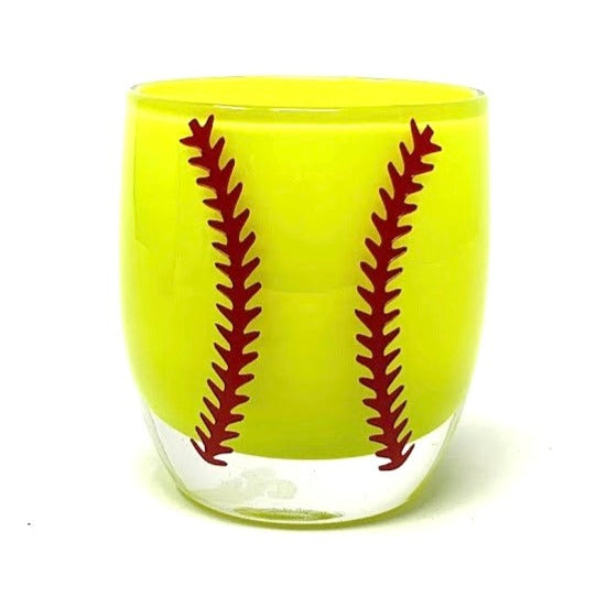 Softball stitching is etched on a votive by National Etching