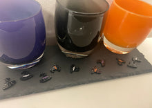 Load image into Gallery viewer, Witch hat table scatter shown on black slate tray with purple, black and orange votives.
